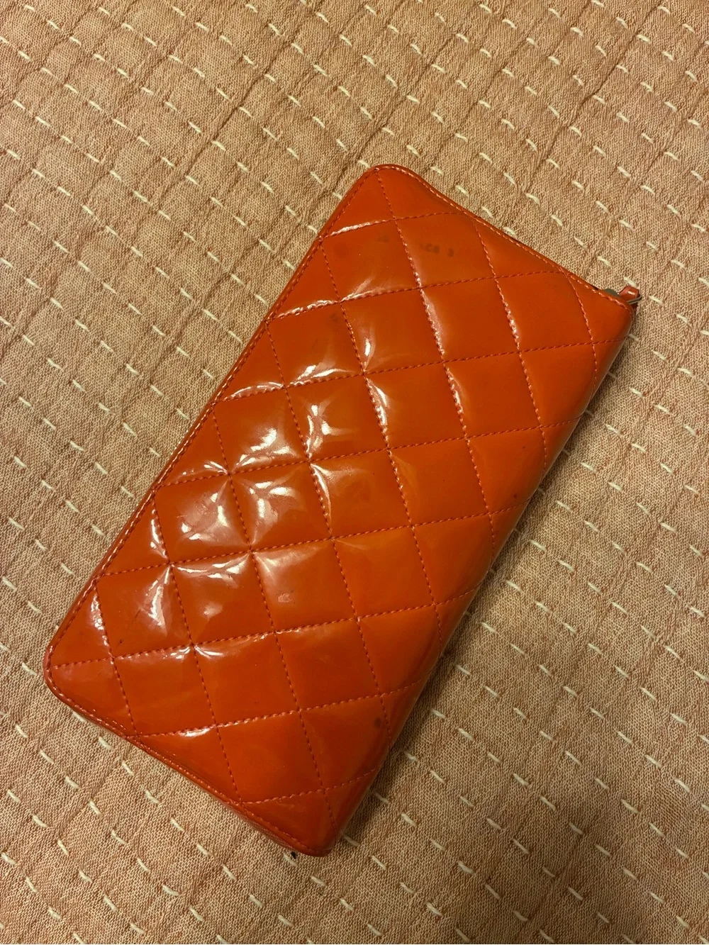 CHANEL Quilted Patent Leather Zip Wallet in Bright Orange